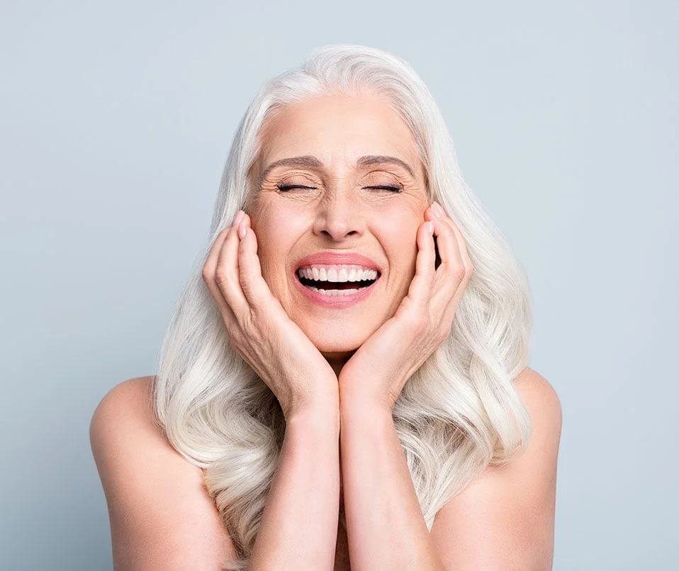 Cosmetic Dentist 13 A mature woman smiling