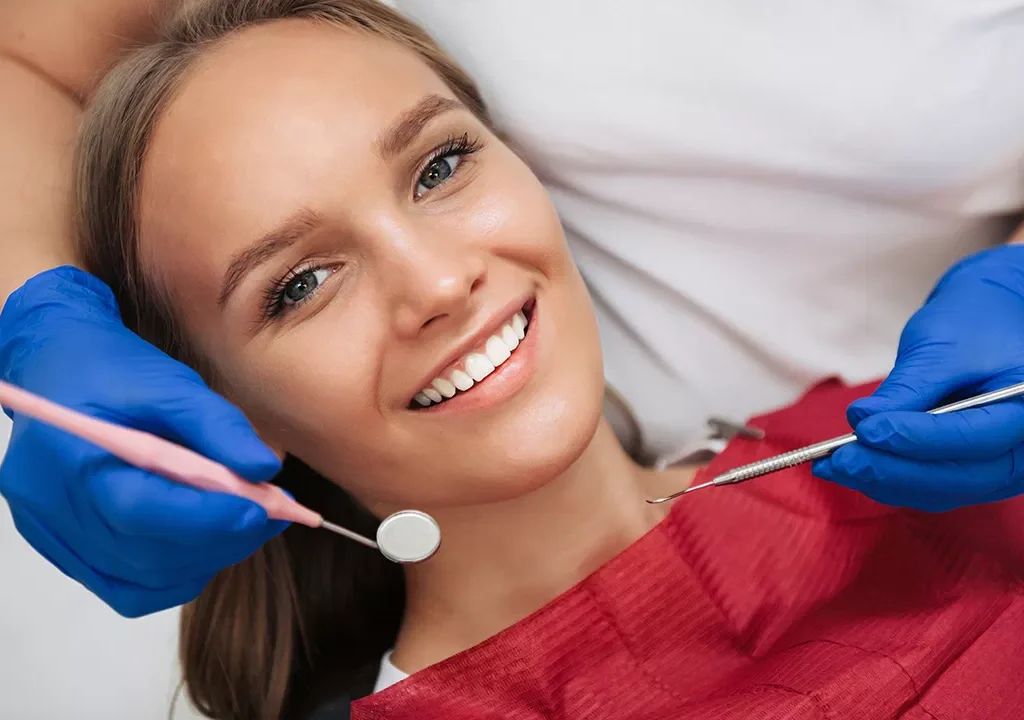 A relaxed patient receiving a comprehensive dental exam and clinical checkup from the expert team near La Mirada.